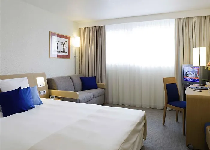 Отель Novotel Cote De Nacre 4*